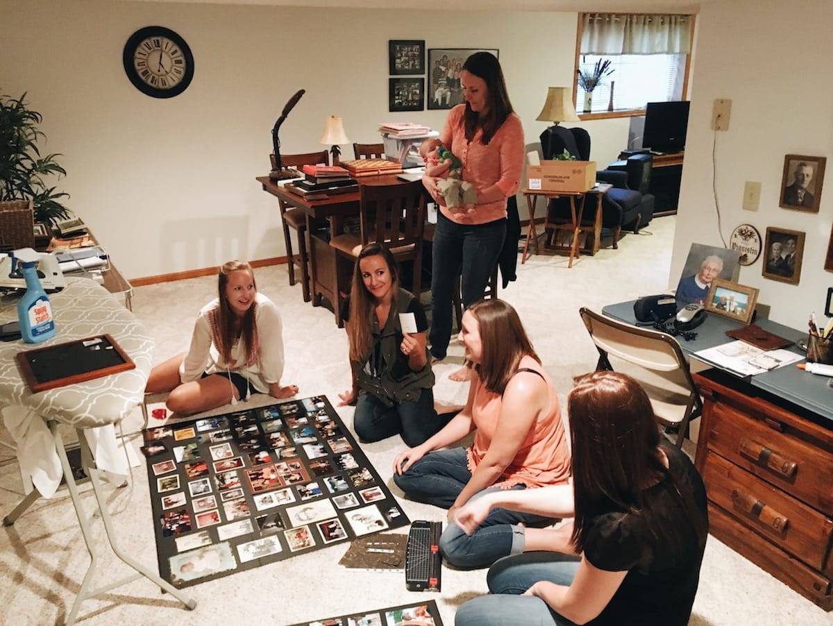 People sitting around a living room.