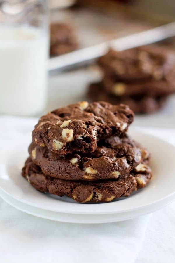 Double chocolate cake mix cookies stacked on each other.