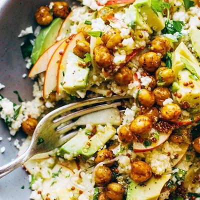 Detox Cauliflower Salad in bowl with fork.