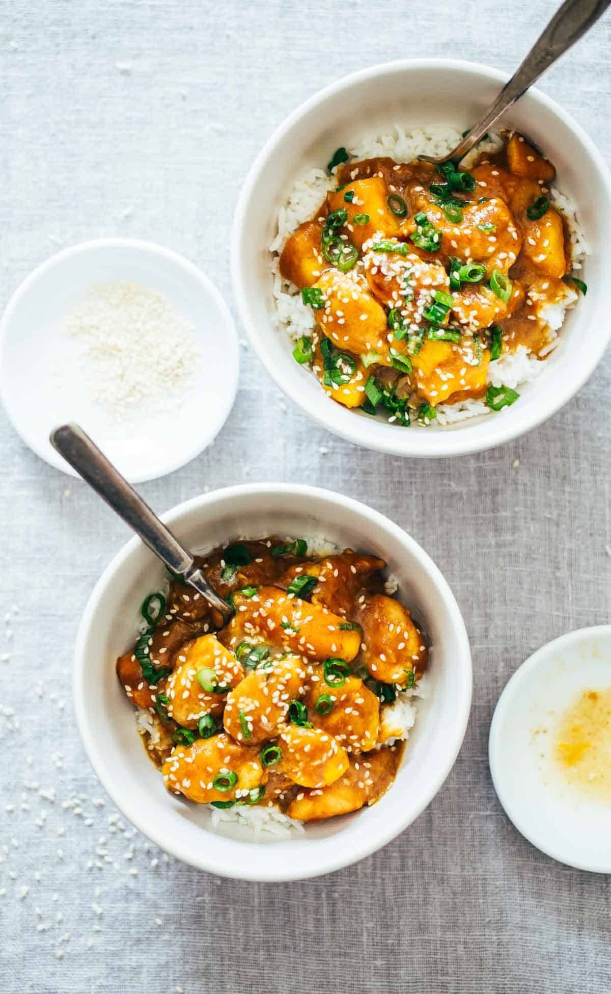 Sesame Mango Chicken Teriyaki over rice in two bowls.
