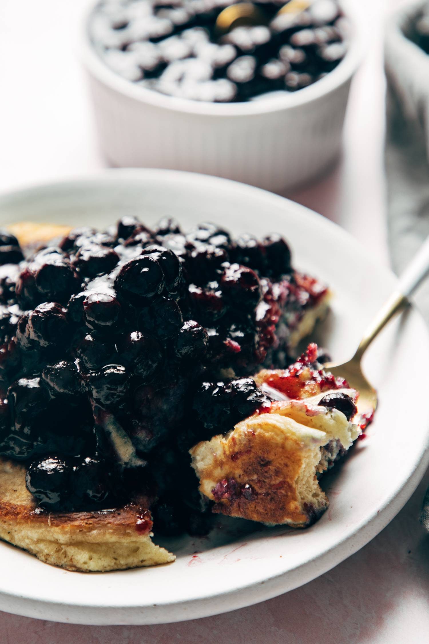 Homemade blueberry sauce on pancakes