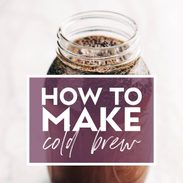 Image of a mason jar filled with coffee grounds and water steeping to make cold brew. There's text over the jar that says "How to Make Cold Brew"