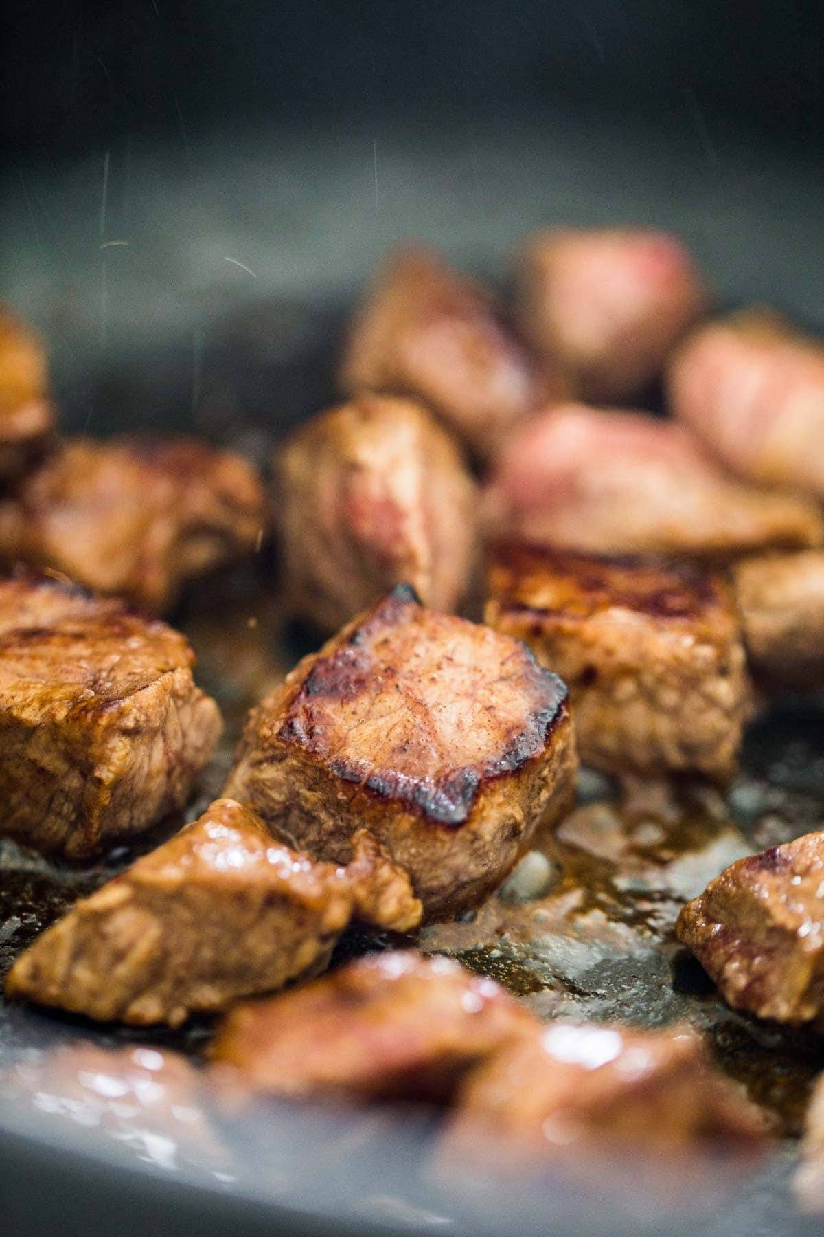 Only 4 ingredients and 20 minutes to make this Creamy Vodka Steak Pasta on zucchini noodles! So very simple and so delicious! | pinchofyum.com