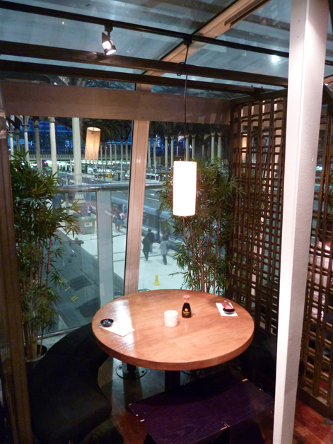 booth with train platform view at Moshi Moshi