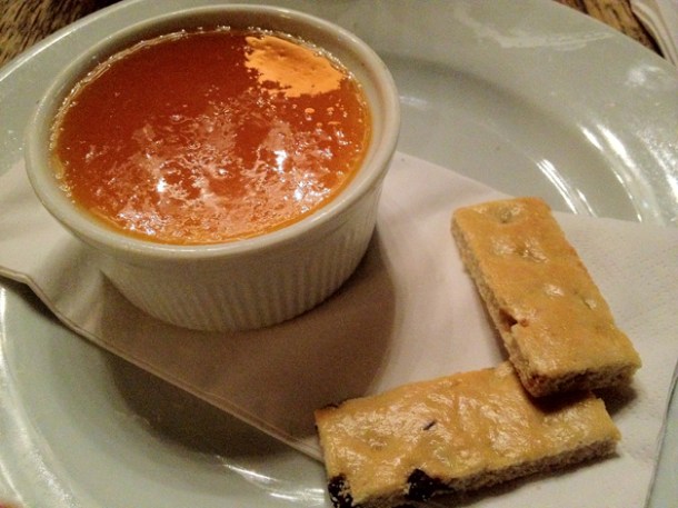 Earl Grey tea pudding with orange syrup and garibaldi biscuits at The Old Dairy earl grey tea pudding with orange syrup and garibaldi biscuits at the old dairy