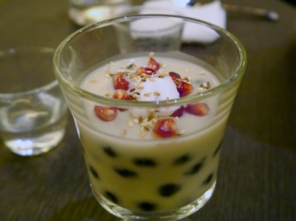 coconut cream and tapioca pearl topped with sesame seeds and pomegranate at Naamyaa Cafe coconut pudding and tapioca pearl topped with sesame seeds and pomegranate at naamyaa cafe