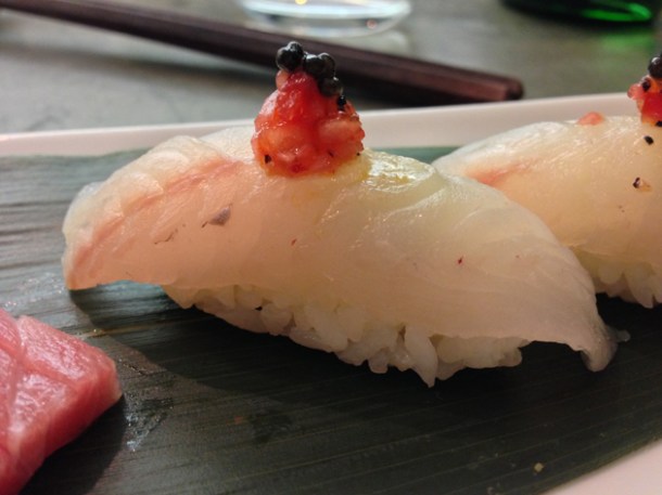 gurnard nigiri sushi with onion, tomato and pepper salsa at Dinings gurnard nigiri sushi with onion, tomato and pepper salsa at dinings