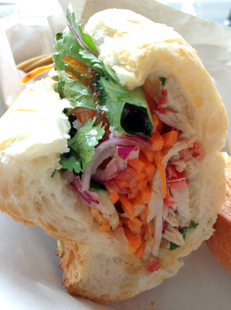 spiced pork and pork roll baguette at banh mi saigon