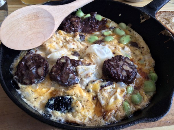 morcilla and broad bean broken eggs at rawduck