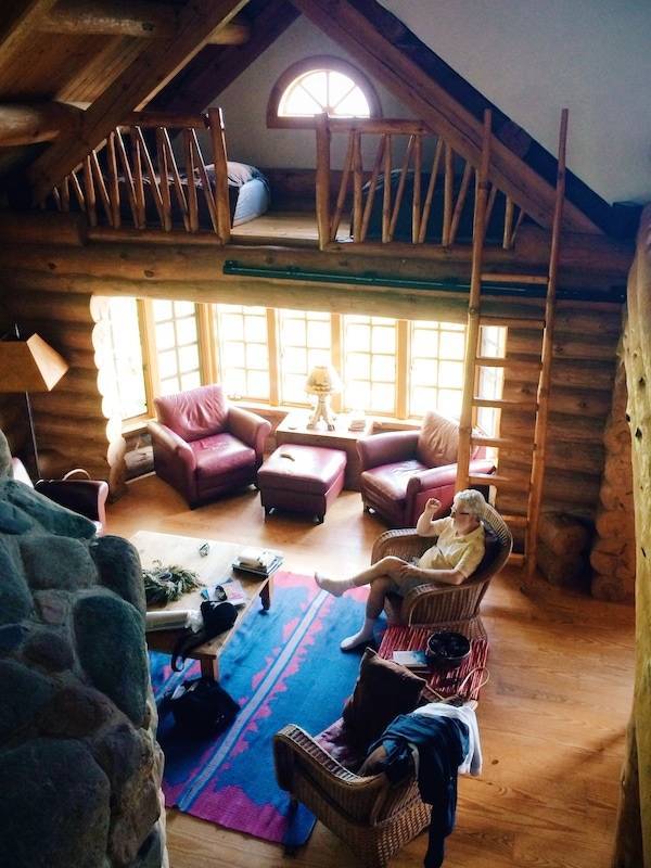 People in a log cabin.