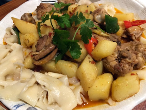 stir fried chicken with hand pulled noodles at xi'an impression