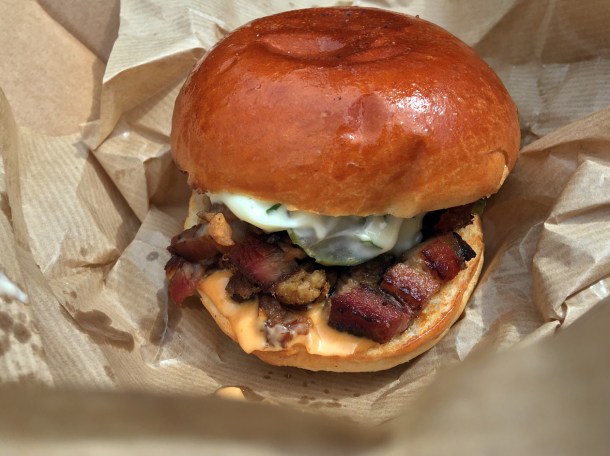 illustrative photo of the chopped pork sandwich from From The Ashes BBQ