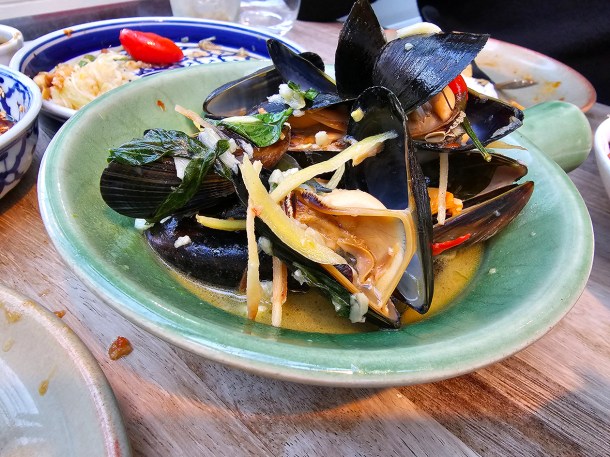 illustrative photo of the stir fried mussels in broth at Begging Bowl