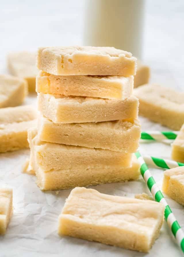 Stacked cookies on a sheet.