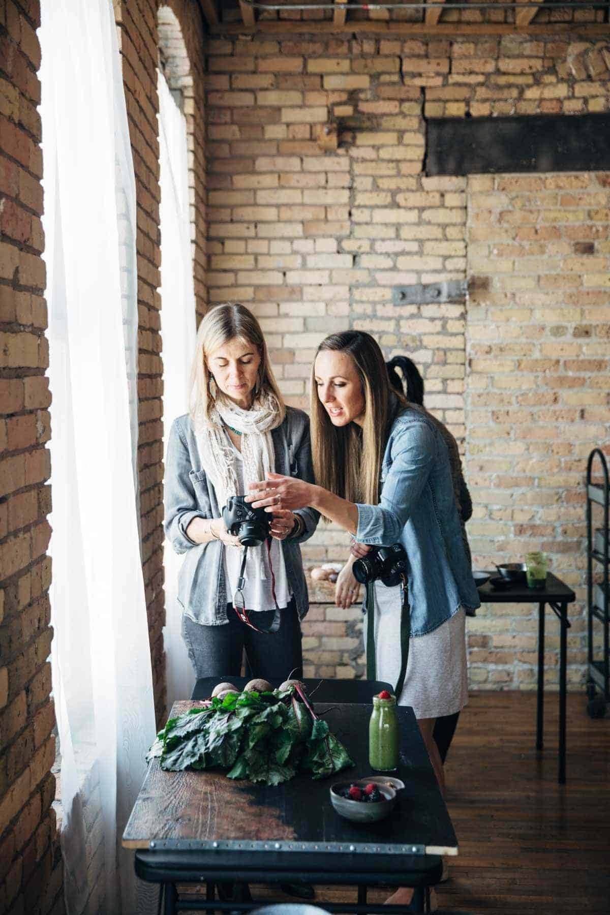 Two women with cameras.